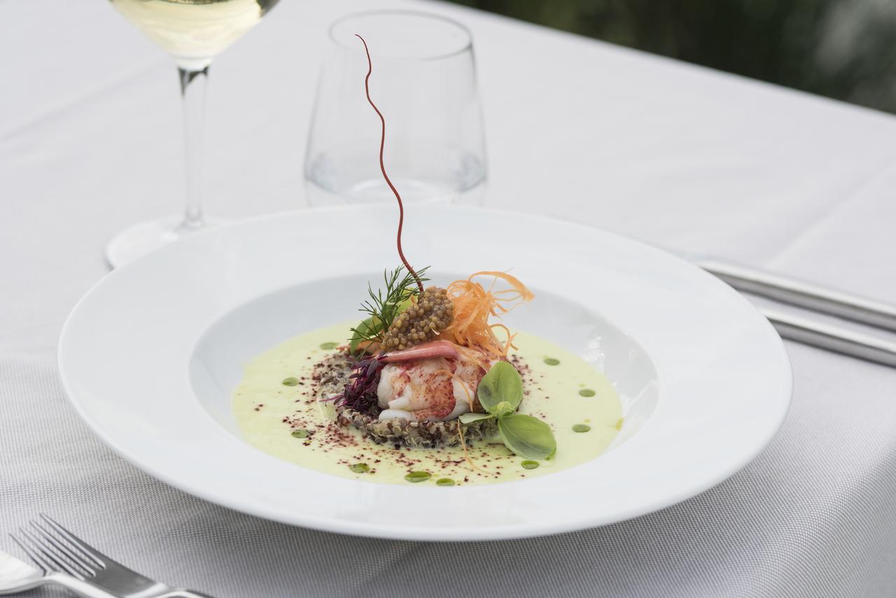 Seehotel Ambach Caldaro Bagian luar foto
